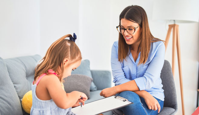 A child drawing on a white paper