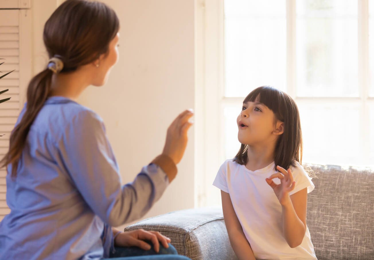 Woman teaching a child